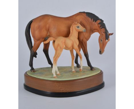 Royal Worcester porcelain equestrian model, Prince's Grace and Foal, No.522, modelled by Doris Lindner,mahogany and ebonised 