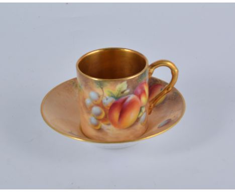 Royal Worcester porcelain coffee can and saucer, still life fruit painted, signed Roberts, the saucer 11cm diameter.