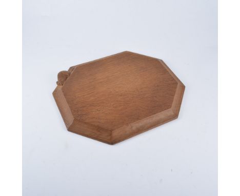 Robert "Mouseman" Thompson of Kilburn, an adzed oak breadboard, octagonal form, 30cm x 25cm.