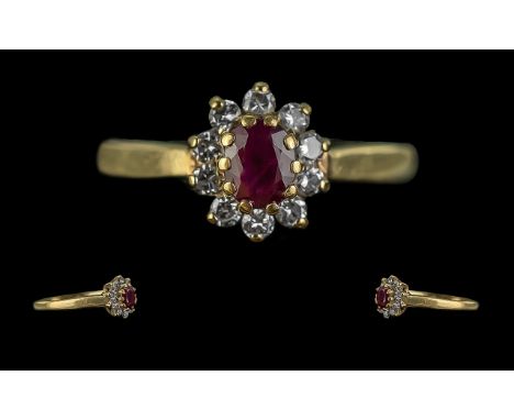 Ladies Attractive 9ct Gold Ruby and Diamond Set Cluster Ring - Flowerhead Design Full Hallmark To Interior of Shank. The Cent