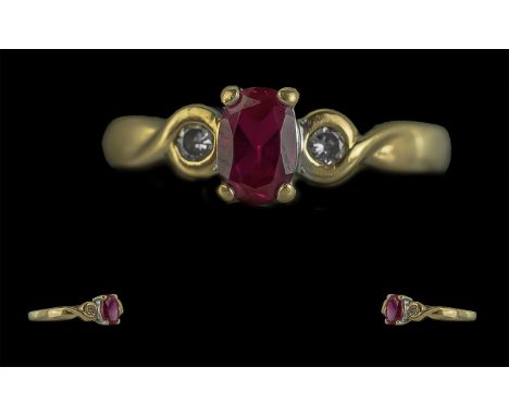 Ladies 18ct Gold Attractive Three Stone Ruby and Diamond Set Ring, with full hallmark to shank, the ruby of excellent colour 