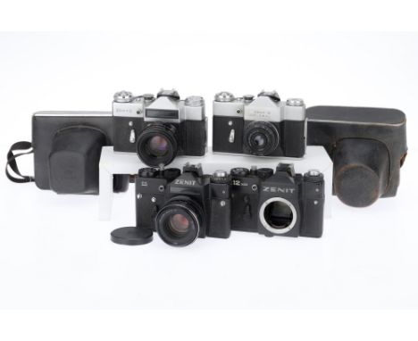 A Selection of Zenit 35mm Cameras, comprising a Zenit-B Global, silver, body G, shutter works, with Industar-50-2 f/3.5 50mm 