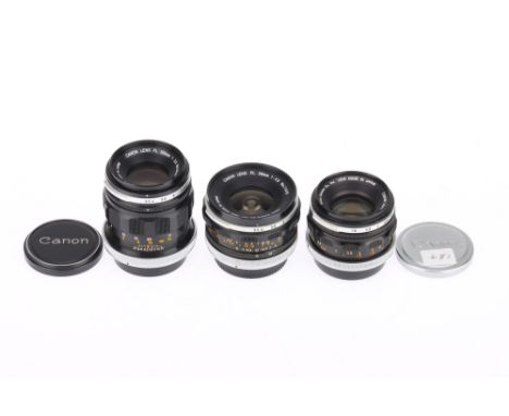 A Trio of Canon FL Camera Lenses, comprising a f/3.5 100mm, serial number 25042, barrel G, optics F with light dust and haze,
