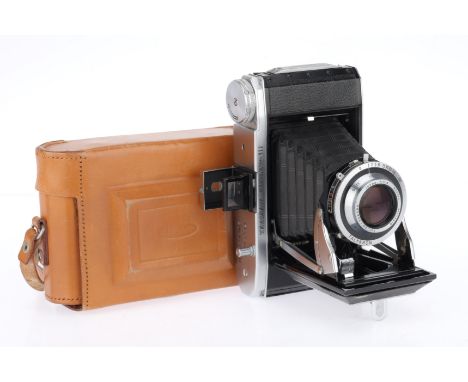 A Kershaw Curlew III Medium Format Folding Camera, with Taylor Hobson Roytal f/3.8 105mm lens, body, F-G, slight lifting of l