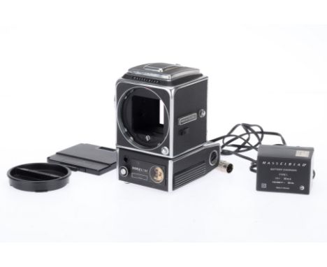 A Hasselblad 500 EL/M Camera Body, black, serial number 0380, no batteries included, shutter is raised, viewfinder is clear, 