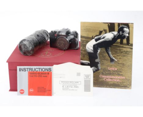 A Leica R4 'Jesse Owens' Golden Anniversary Camera, 1987, black, serial no. 1672632, with Leitz Vario-Elmar-R f/4 70-210mm le