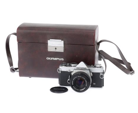 An Olympus OM-1N MD 35mm SLR Camera chrome, 1979-83, serial no.1951813, with an OM-System Zuiko Auto-S f/1.8 50mm lens, shutt