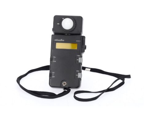 A Minolta Flash Meter III, black, serial number 102574, body VG, powers up, takes a reading.