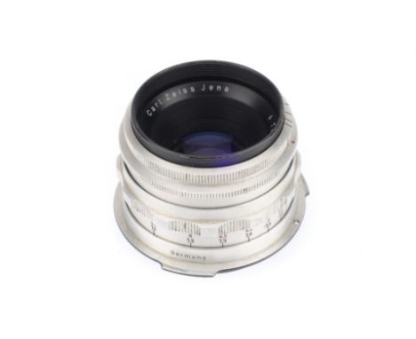 A Carl Zeiss Jena f/2.8 80mm Lens, silver, serial number 3691017, barrel G, optics F-G with light fungus and dust, iris worki
