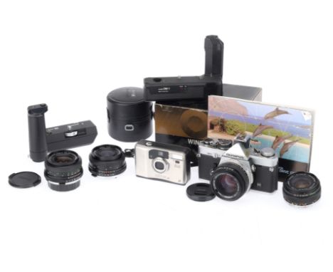 A Group of Olympus SLR Equipment comprising an OM-2N camera with a Zuiko MC Auto-S f/1.8 50mm lens, shutter not working, an O