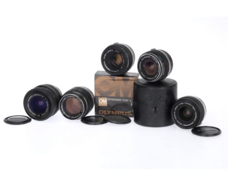 A Selection of Olympus OM System Lenses, to include a Zuiko Auto-W f/2.8 28mm, barrel G, optics G with haze, with caps, a Zui