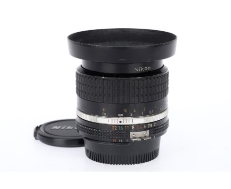 A Nikon Nikkor f/2 35mm Ai Camera Lens, black, serial number 250917, barrel G, some paint wear, iris works, aperture blades m