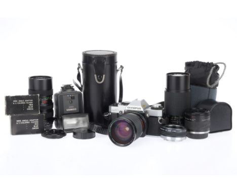 An Olympus OM20 35mm SLR Camera with Lenses chrome, circa 1982, serial no.1233185, with a Sunactinon Auto Zoom f/3.5-4.5 28-8