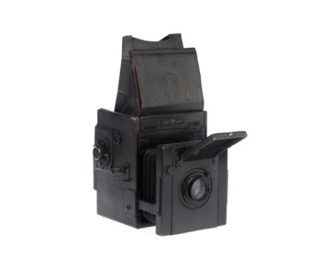 A Thornton Pickard Junior Special Ruby Reflex Camera circa 1930, quarter plate, with a Carl Zeiss Jena Triotar f/4.5 15cm (15