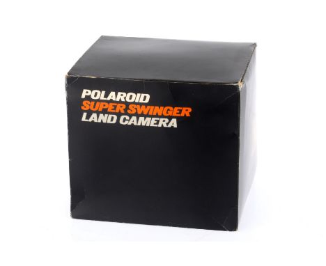 A Polaroid Super Swinger Instant Camera camera dismantled by a previous owner, in a 1960s Super Swinger retail box, possibly 