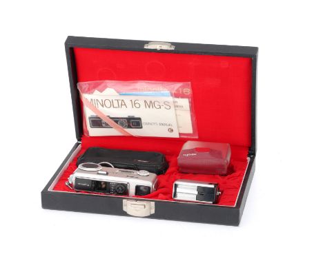 A Minolta-16 MG-S Spy Camera Outfit, silver, serial number 154588, body G, shutter working, iris working, with attachable fla
