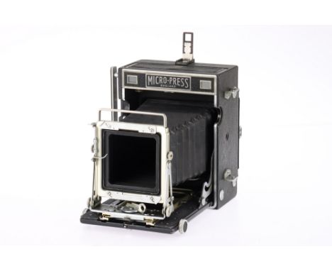 An M.P.P. Micro-Press 5x4 Camera Body, body G, bellows extends and locks, not light tested, rangefinder patch is clear and mo