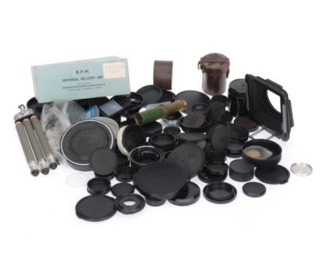 A Large Selection of Lens and Camera Caps, to include many caps, various sizes and makers, a small tripod and some bellows.
