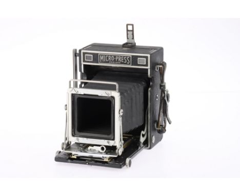 An M.P.P. Micro-Press 5x4 Camera Body, body G, bellows extends and locks, not light tested, rangefinder patch is clear and mo
