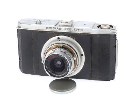 A Modified Kershaw Curlew II Camera, black, serial number 3/6240, body F, no longer a folding camera, has been fitted with a 