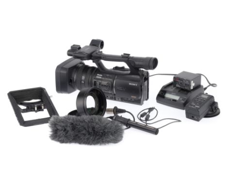 A Sony HVR-Z5E HDV / Digital HD Video Camera Recorder, black, body G-VG, appears working at time of action, LCD screen works,