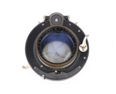 A Boyer Saphir f/f.5 210mm Large Format Lens, black, barrel F, with paint wear, optics F-G with light haze, in a large compou