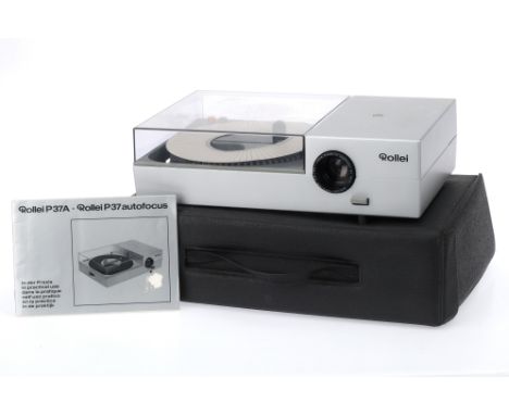 A Rollei P37A Autofocus Carousel Slide Projector, condition G, with wired remote control, instructions and original carry cas