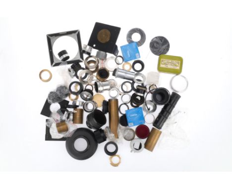 A Large Selection of Camera Lens Adaptors, to include many makers and sizes, mostly screw mount, some home made, a lot.