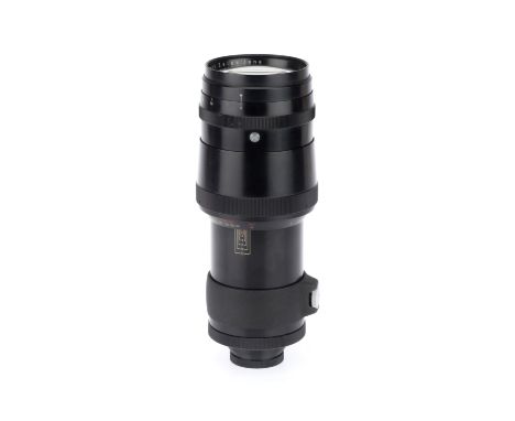 A Carl Zeiss Jena Sonnar f/4 300mm Lens, black, serial number 4467701, body G, aperture ring is jammed, optics F with interna