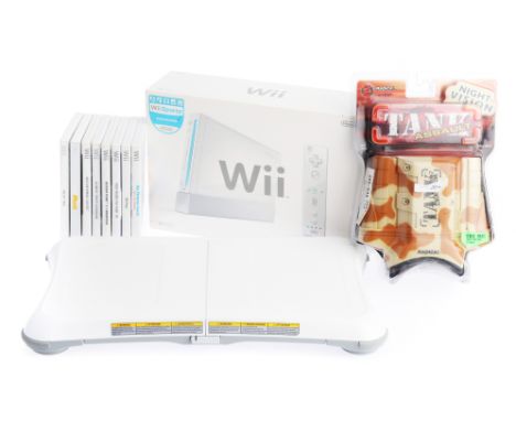 A Nintendo Wii RVL001 With Accessories and Software, comprising a Wii model RVL001, in the maker's original packaging, appear
