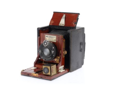A Sinclair Una Hand &amp; Stand Mahogany &amp; Brass Camera, black leather, for 2½x3½ plates, body F, some marks to leather, 