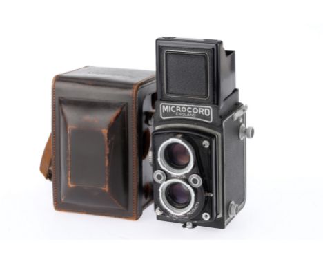 A M.P.P. Microcord I TLR Camera, black, serial number 7618, body F-G, advance works, viewing lens needs attention, focus cann