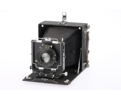 A MPP Micro Technical 5x4" Camera, body, P, a lot of wear to the leather, front door does not latch closed, bellows extends a