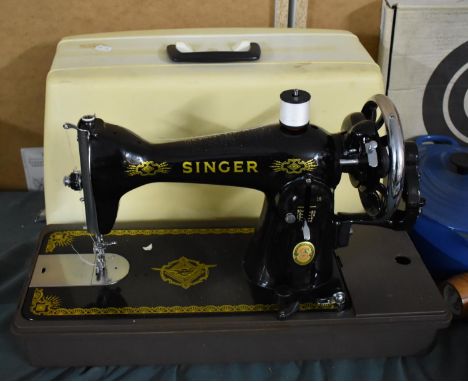 A Vintage Manual Singer Sewing Machine 