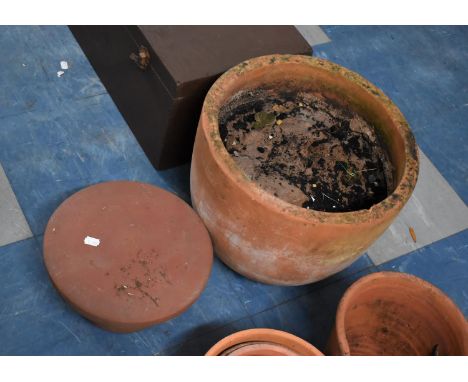 A Circular Terracotta Planter, 38cms Diameter and a Terracotta Strawberry Planter Section 