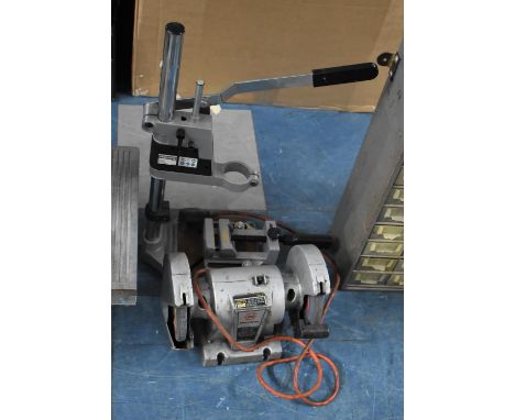 A Modern Workbench top Drill Stand by Powerfix and a Black and Decker Two Wheel Grinder 