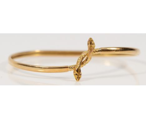 A 14k gold twin headed snake bangle, 60mm internal, 5.8g