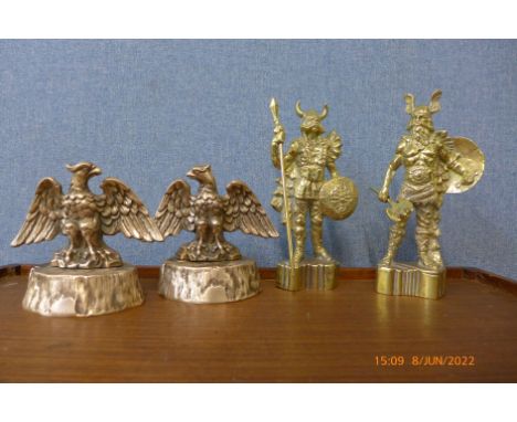 Two pairs of vintage brass door stops 