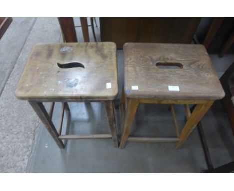Two vintage beech laboratory stools 