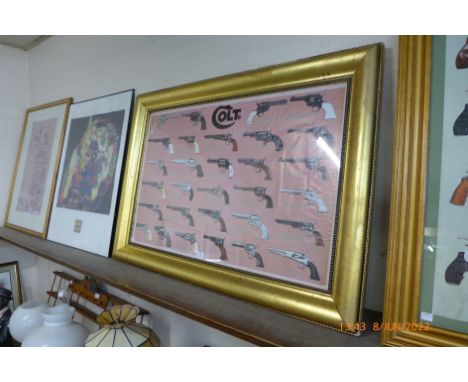 A Colt revolver print, framed 