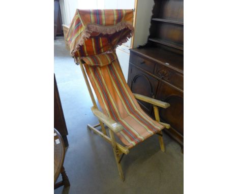 A vintage canopy sun lounger 