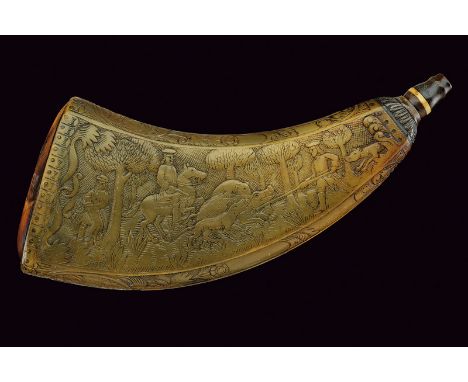 A beautiful carved powder-flask by J. F. Goetze in Hohen Limburg dating: circa 1800 provenance: Germany Of pressed cow horn; 