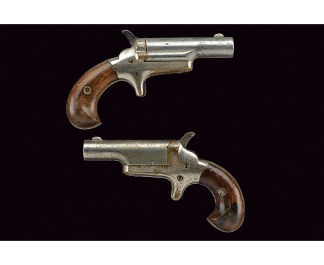 A pair Deringer pistols dating: third quarter of the 19th Century provenance: USA A Colt Third Model Deringer with rifled bar