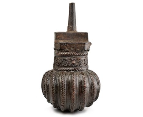 A beautiful Cuir-Bouilli powder-flask dating: 17th Century provenance: Italy Body covered with embossed, boiled leather; the 