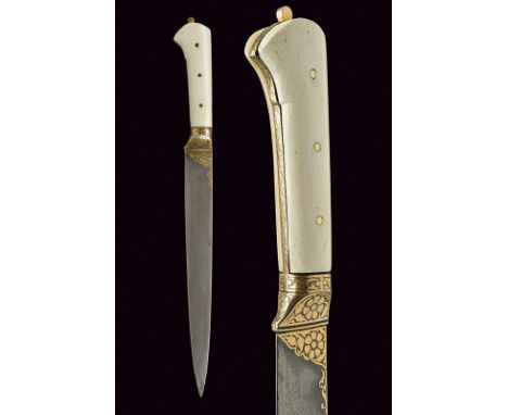 A kard dating: late 19th Century provenance: Indopersia Straight, single-edged, damask blade, with slightly hollow faces, fea