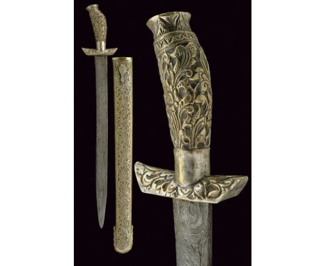 A Pedang lurus dating: last quarter of the 19th Century provenance: Indonesia Single -and short false-edged blade of beautifu