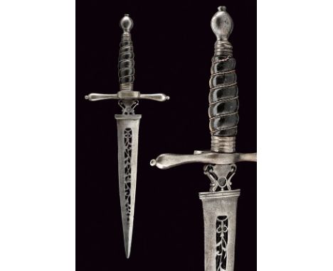 A left hand dagger with pierced blade dating: 18th Century provenance: Germany Straight, double-edged blade, the centre richl