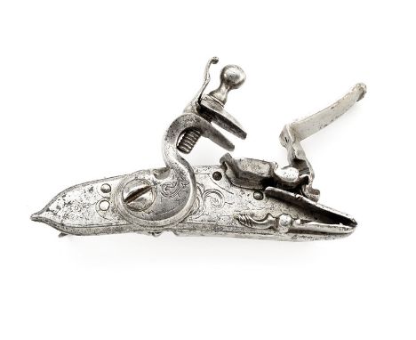 An engraved flintlock dating: first quarter of the 19th Century provenance: Italy Lock and hammer engraved with floral motifs