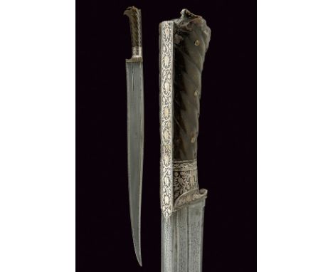 A long Khyber knife dating: mid-19th Century provenance: Afghanistan Slightly curved, single-edged blade with "T"-back; fine,