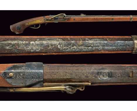 A teppo with decorated barrel dating: 19th Century provenance: Japan Smooth, octagonal, 12 mm cal. barrel with fore -and rear